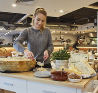 Flaming Cheese Wheel and Wine Experience Gasworks - New South Wales Tourism 