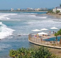 Family Romance Fun on Kings Beach - New South Wales Tourism 