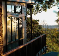 Rainforest Gardens - Luxury Hillside Chalets with Views to Bay  Islands - New South Wales Tourism 