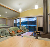 Arthur Riverfront and Sea Lodge downstream - New South Wales Tourism 