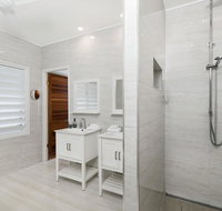 Bathers across the bay from Port Douglas - New South Wales Tourism 